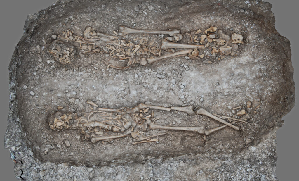 Grave 9 showing 2 human skeletons in situ