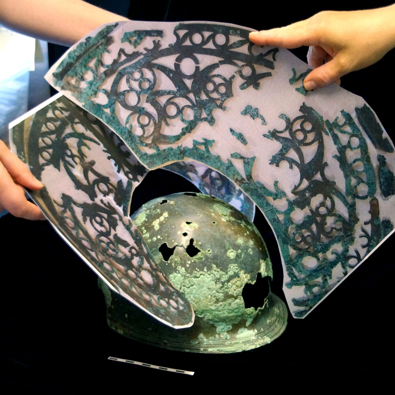 Fig13 Images of the helmet pieces held in place where they would have been.